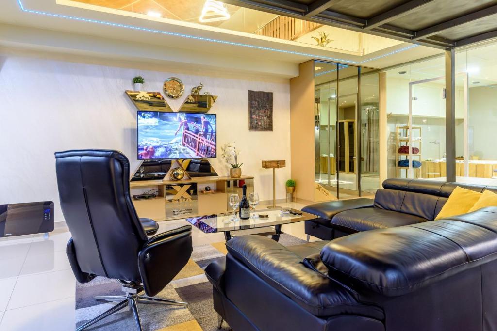 Μια τηλεόραση ή/και κέντρο ψυχαγωγίας στο Xspa apartment cryptocurrency pay available