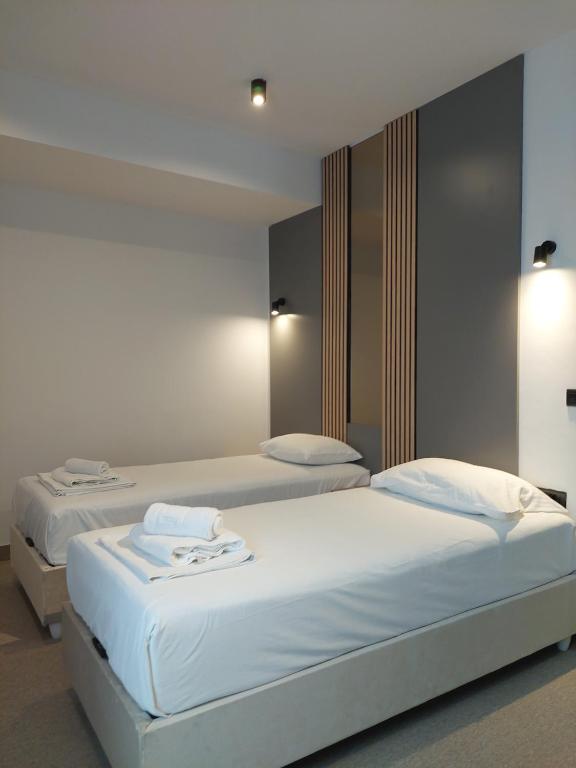 Postel nebo postele na pokoji v ubytování Hotel Almanas
