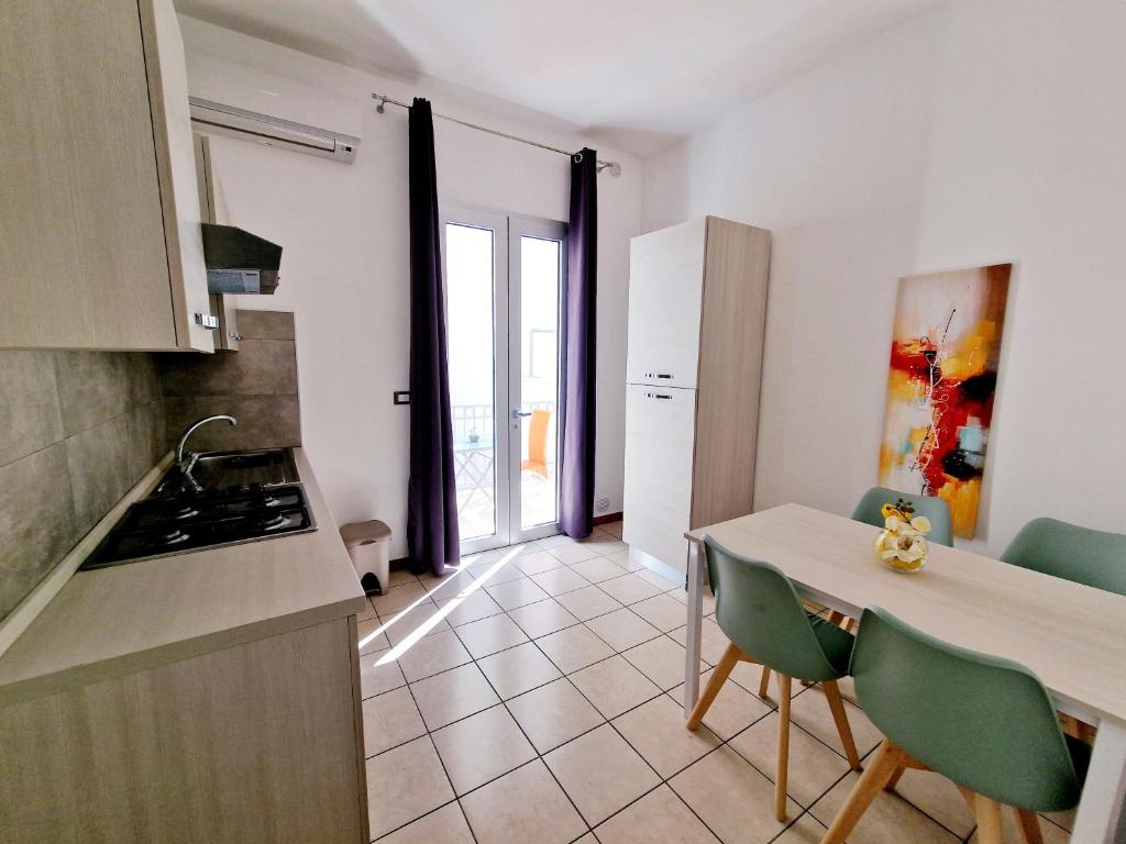 Kuchyň nebo kuchyňský kout v ubytování Marebed Apartments & Rooms