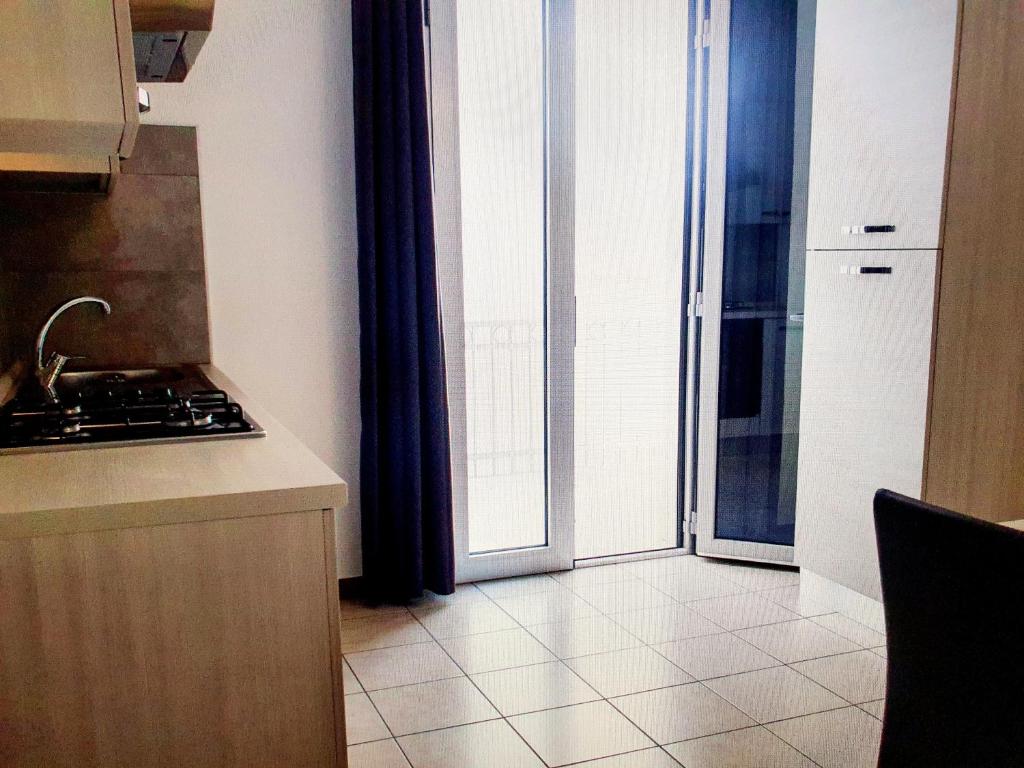 Kuchyň nebo kuchyňský kout v ubytování Marebed Apartments & Rooms