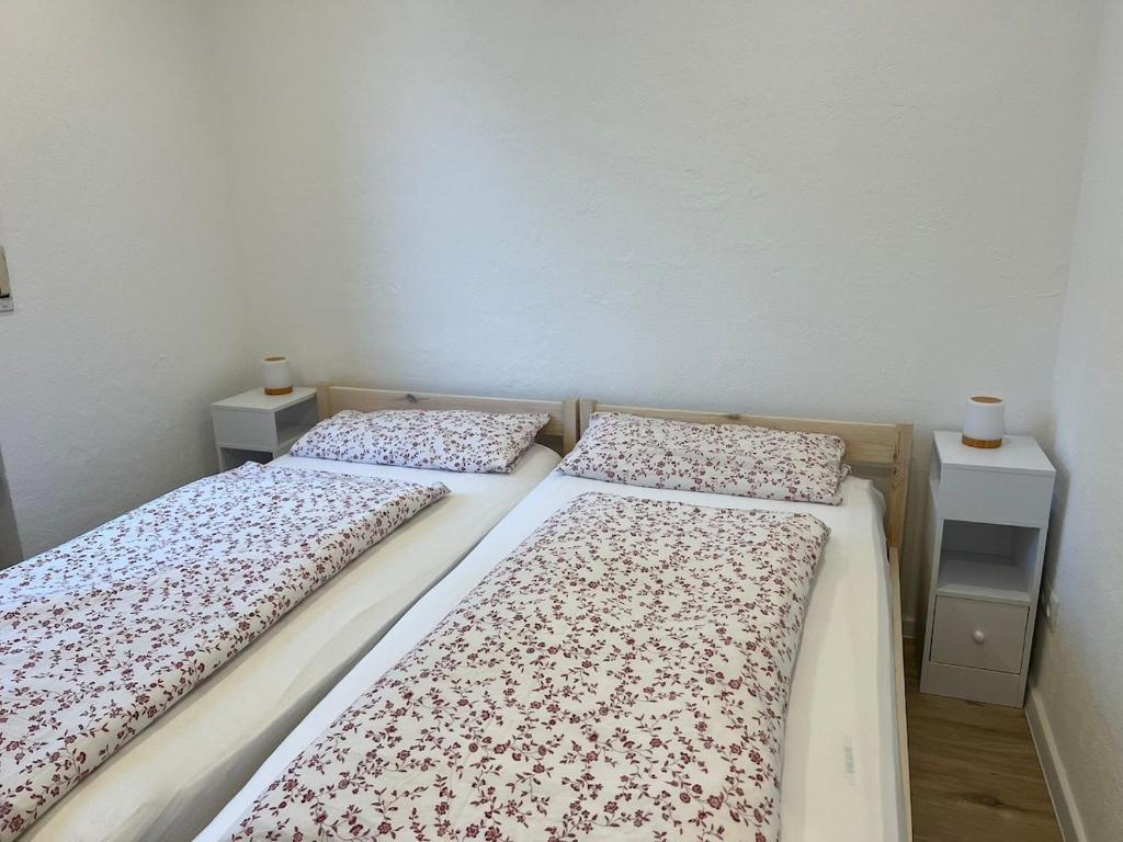 Postel nebo postele na pokoji v ubytování Kleine Wohlfühloase