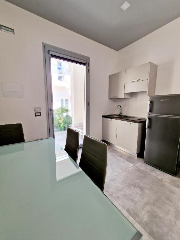 Kuchyň nebo kuchyňský kout v ubytování Marebed Apartments & Rooms