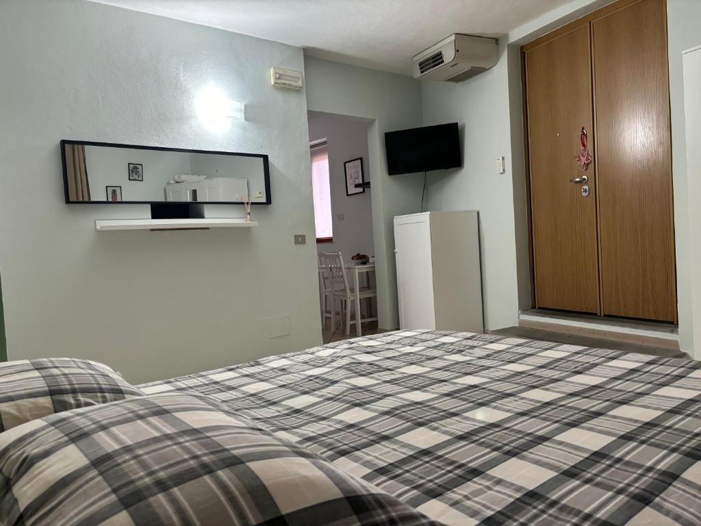 Postel nebo postele na pokoji v ubytování Casa di Greve