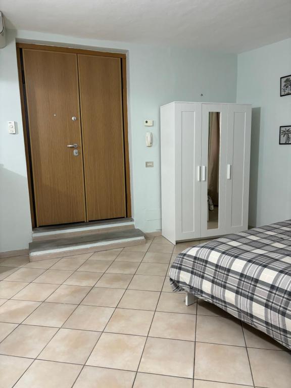 Postel nebo postele na pokoji v ubytování Casa di Greve