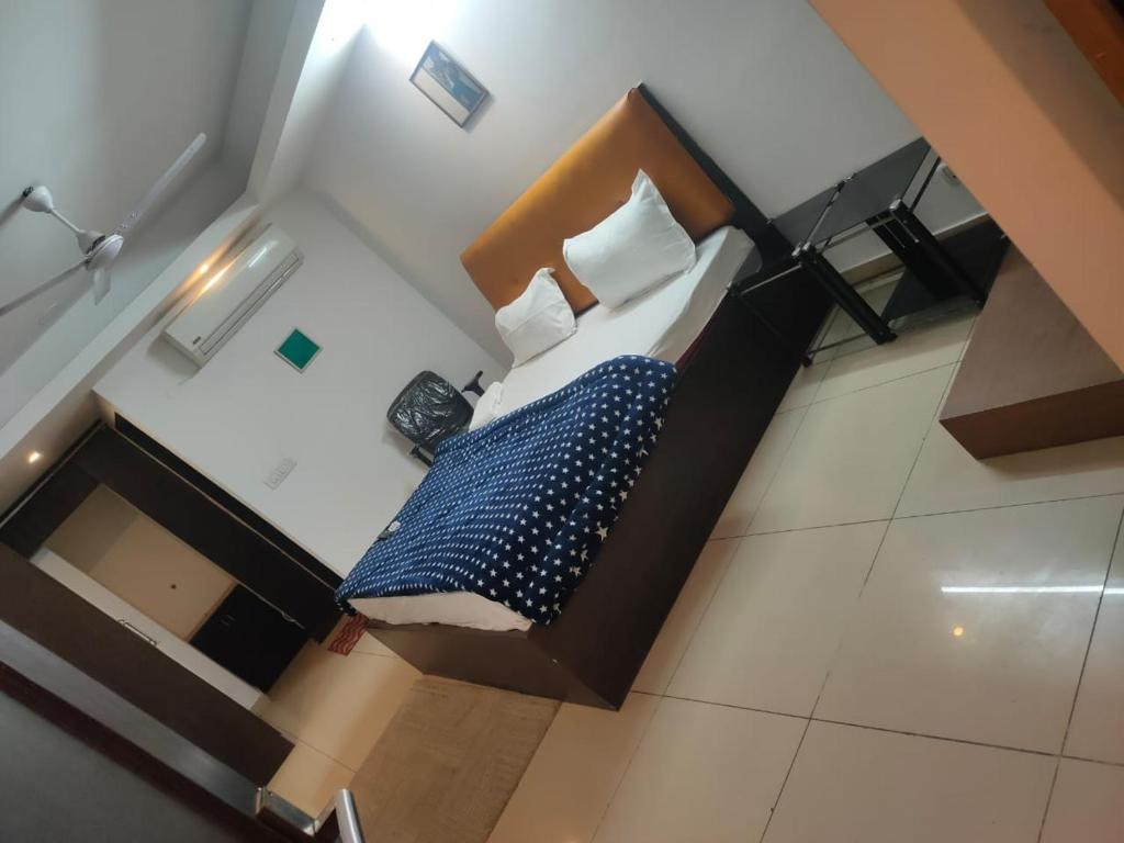 Postel nebo postele na pokoji v ubytování Hotel Blueberry