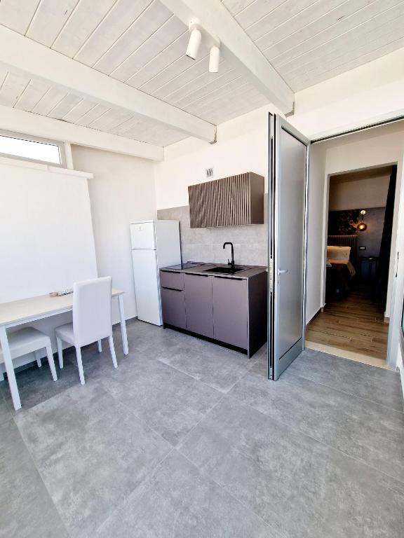 Kuchyň nebo kuchyňský kout v ubytování Marebed Apartments & Rooms
