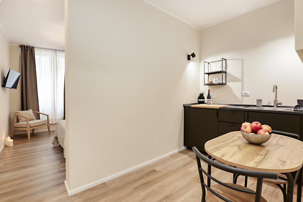 Kuchyň nebo kuchyňský kout v ubytování Welchome - Suites