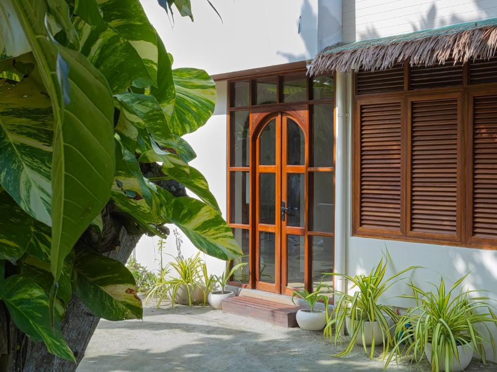 Zahrada ubytování Ithaa Inn Kamadhoo