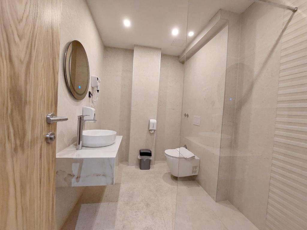 Koupelna v ubytování Hotel Almanas