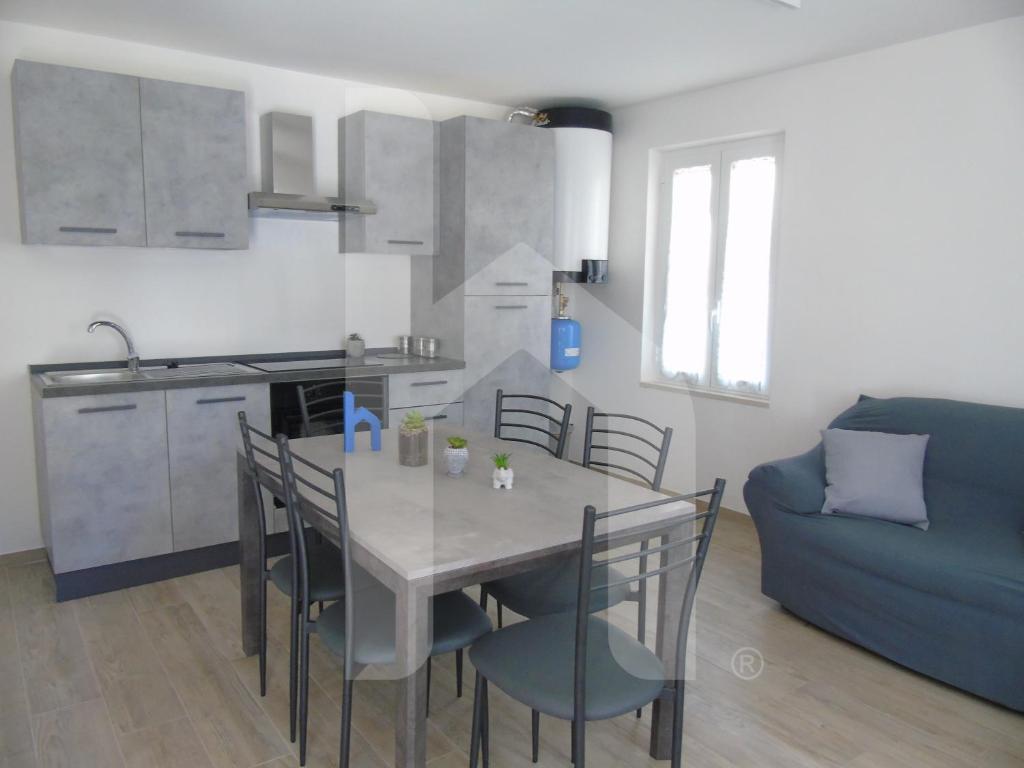 Kuchyň nebo kuchyňský kout v ubytování Homiday - Residenza Tulipani