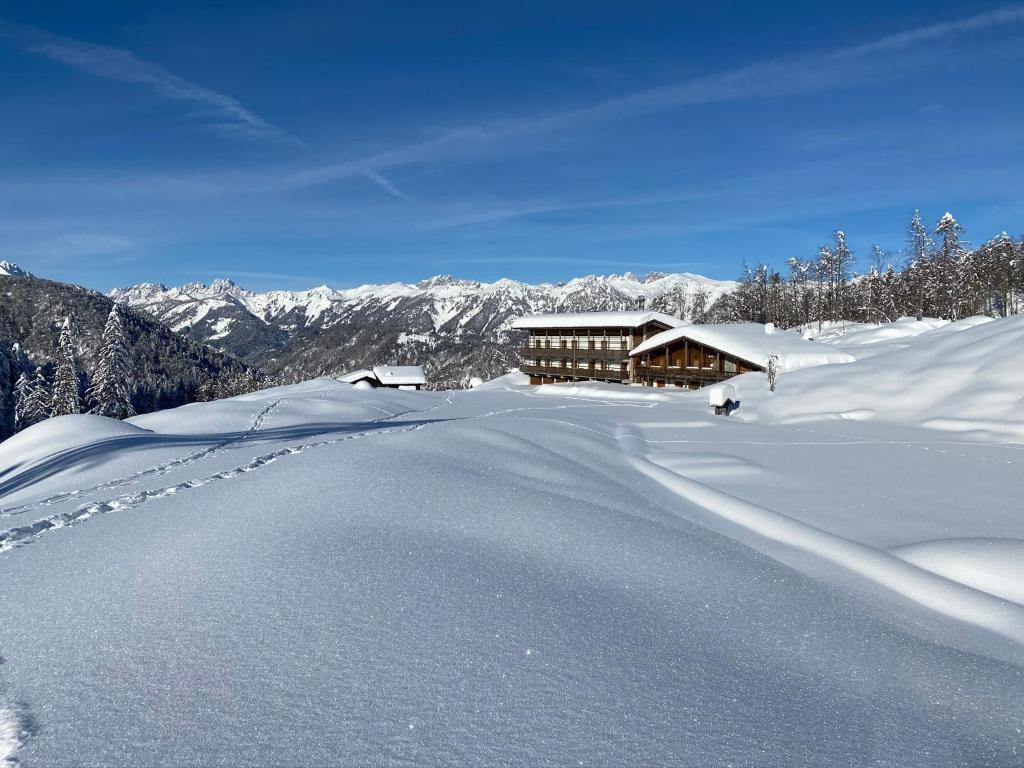 Rifugio Escursionistico Tita Piaz v zimě