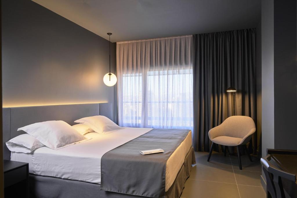 Letto o letti in una camera di Barcelona Princess
