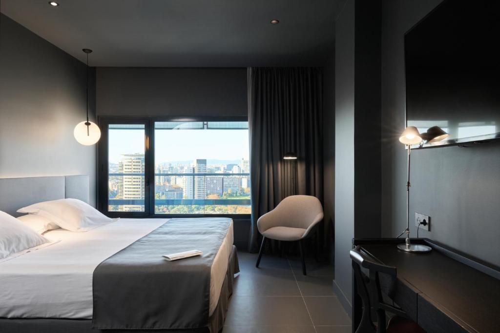Letto o letti in una camera di Barcelona Princess