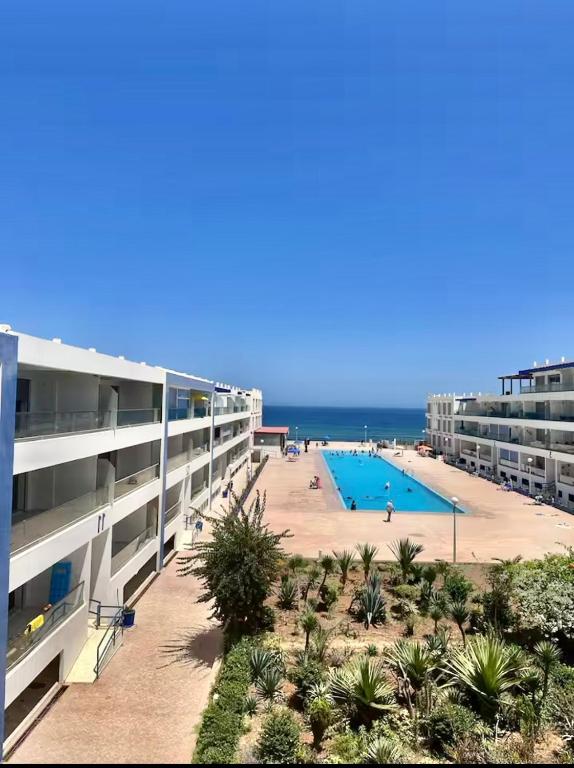Bazén v ubytování Appart en bord de mer avec piscine vue imprenable nebo v jeho okolí