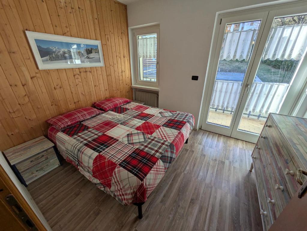 Postel nebo postele na pokoji v ubytování Apartments Giovannini