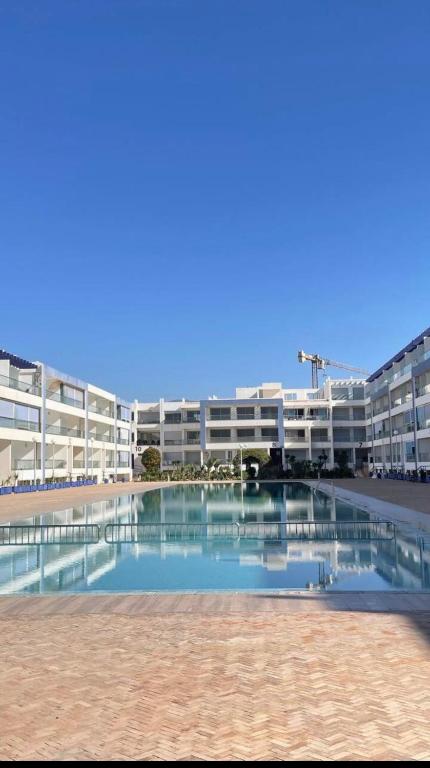 Bazén v ubytování Appartement moderne avec une vue spectaculaire sur l océan nebo v jeho okolí