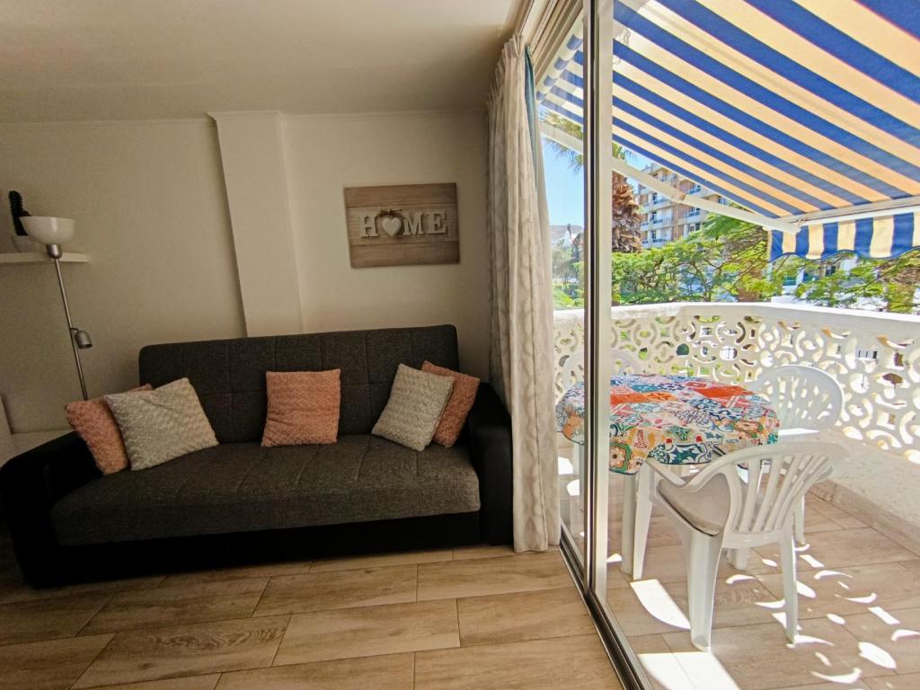 Posezení v ubytování Apartamento Margarita con piscina en Playa Honda, Playa las Américas