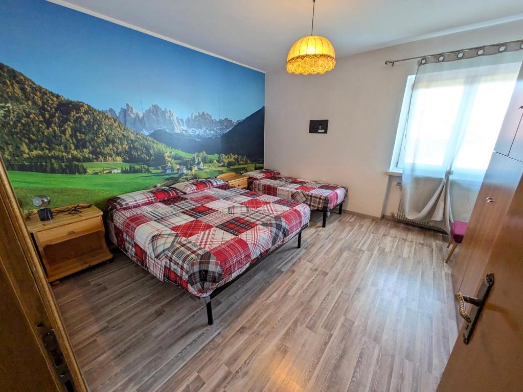 Postel nebo postele na pokoji v ubytování Apartments Giovannini