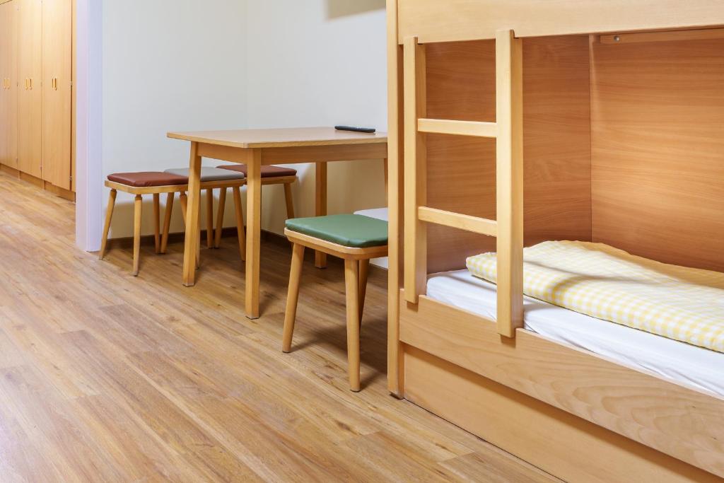 Postel nebo postele na pokoji v ubytování Planner Alpenhof