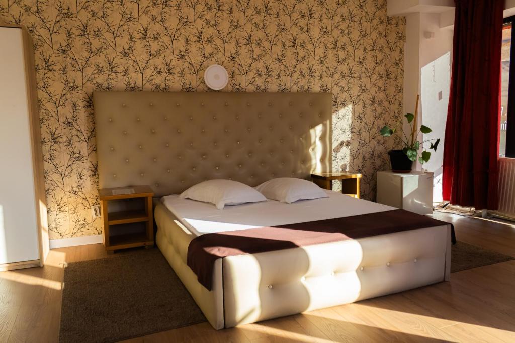 Postel nebo postele na pokoji v ubytování Hotel Funnytime