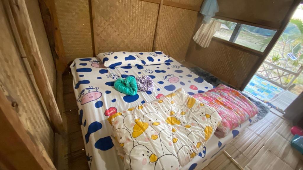 Postel nebo postele na pokoji v ubytování Poopha home stay