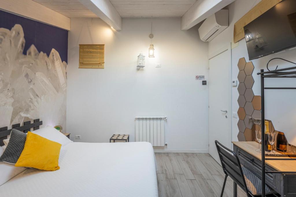 Postel nebo postele na pokoji v ubytování Acquamarina b&b