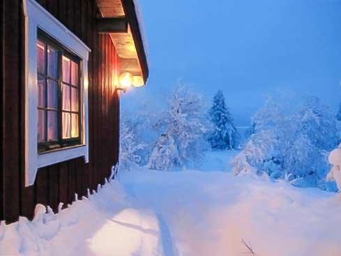a window of a house covered in snow at Trysilfjellet Nord 637 in Trysil