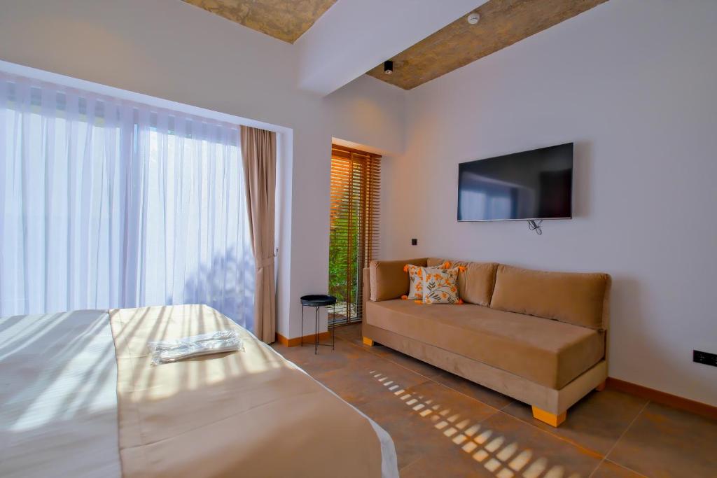 Postel nebo postele na pokoji v ubytování Nakas Hotel