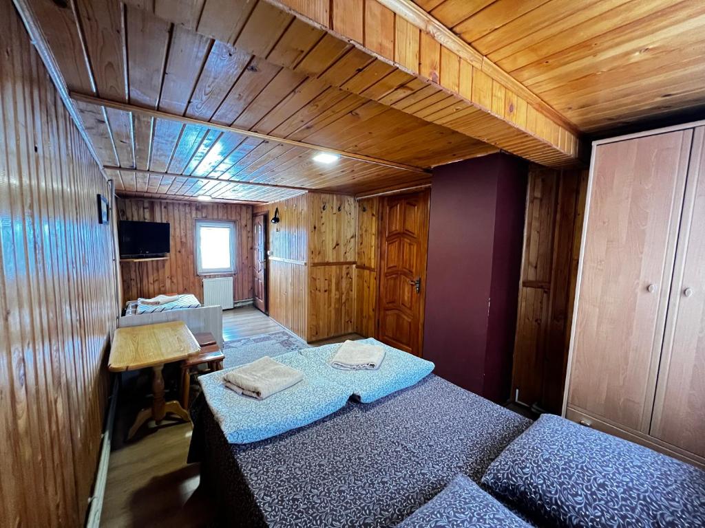 Postel nebo postele na pokoji v ubytování Pid Playem