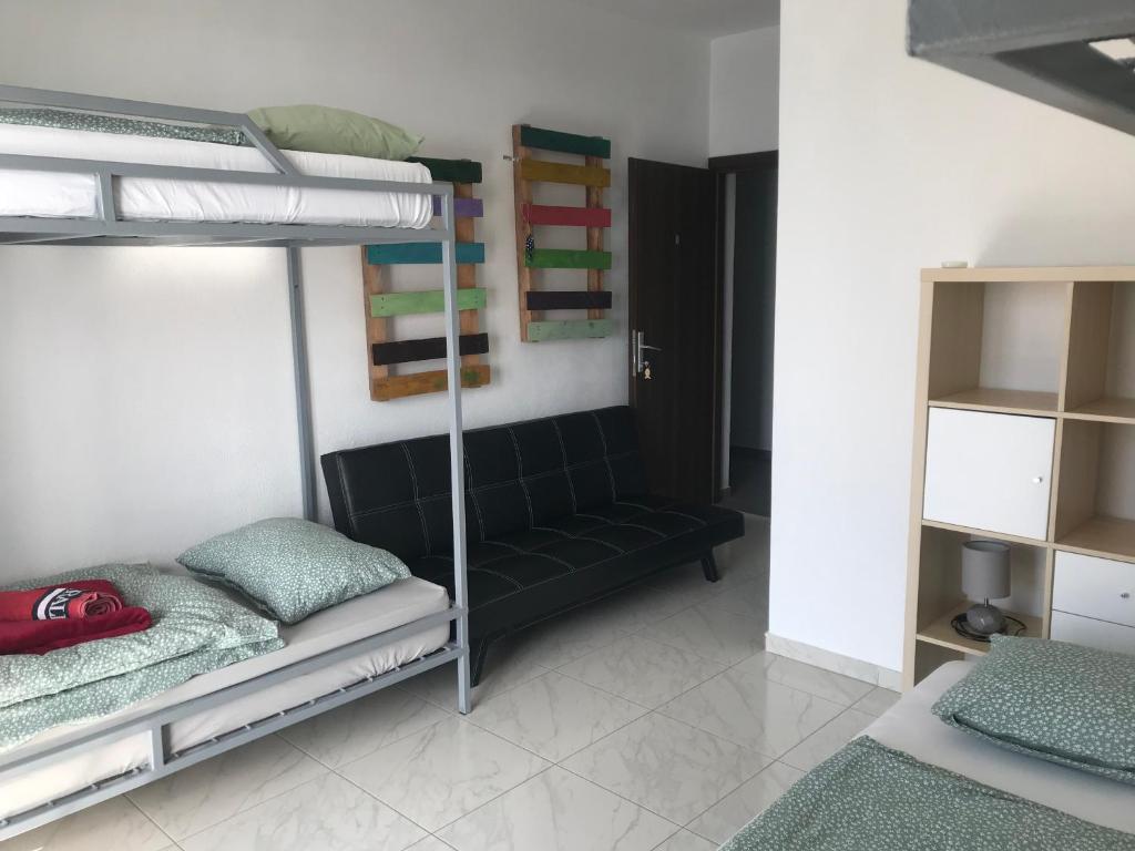 Postel nebo postele na pokoji v ubytování Hostel Dalmatia