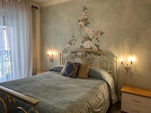 A bed or beds in a room at Hotel & Residence Corona Grossa Balangero