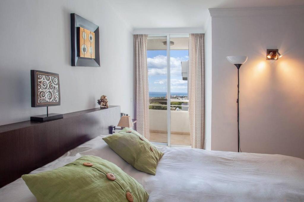 Postel nebo postele na pokoji v ubytování Stunning Ocean View Apartment