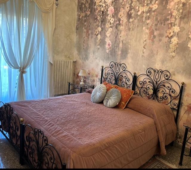 A bed or beds in a room at Hotel & Residence Corona Grossa Balangero