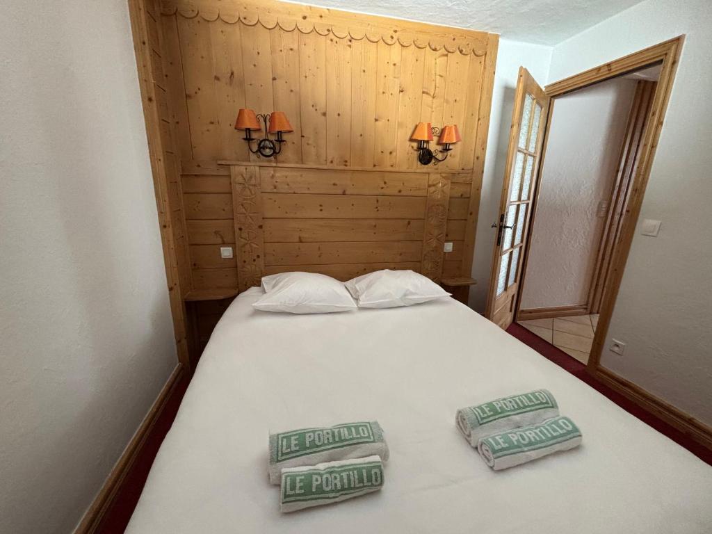 Postel nebo postele na pokoji v ubytování Résidence Le Portillo