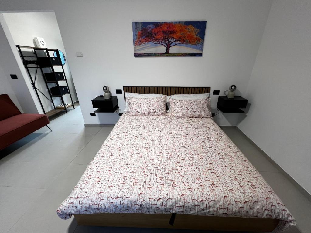 Postel nebo postele na pokoji v ubytování The One Malpensa Rooms