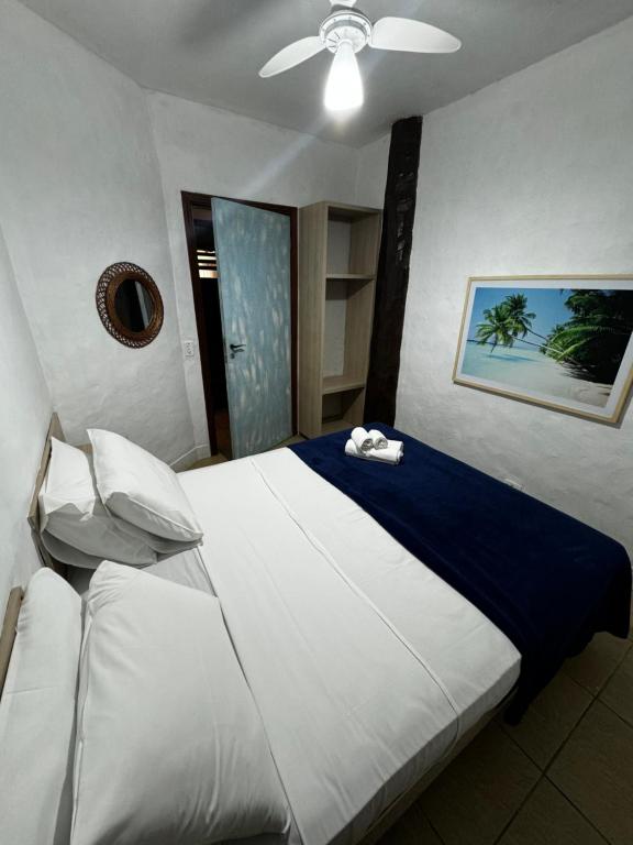 Cama ou camas em um quarto em Pousada Baobá