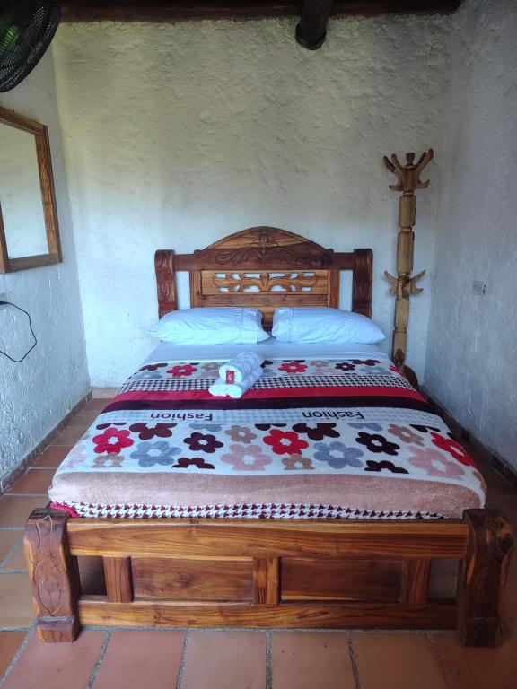 Postel nebo postele na pokoji v ubytování Hotel El Santuario