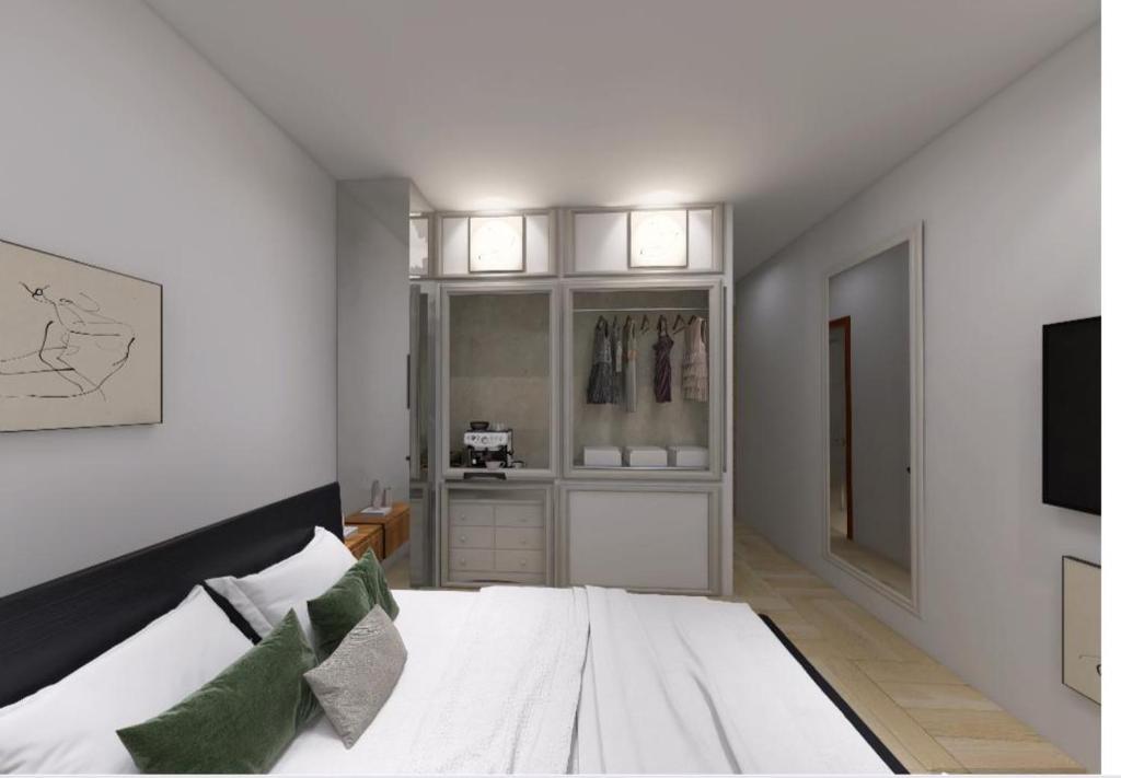 Postel nebo postele na pokoji v ubytování Bazaar Inn Hotel
