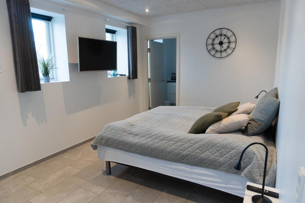 Postel nebo postele na pokoji v ubytování Birkelse Hotel og Kro