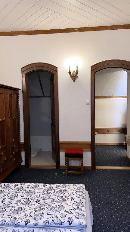 Postel nebo postele na pokoji v ubytování Veszprémvölgyi Kúria