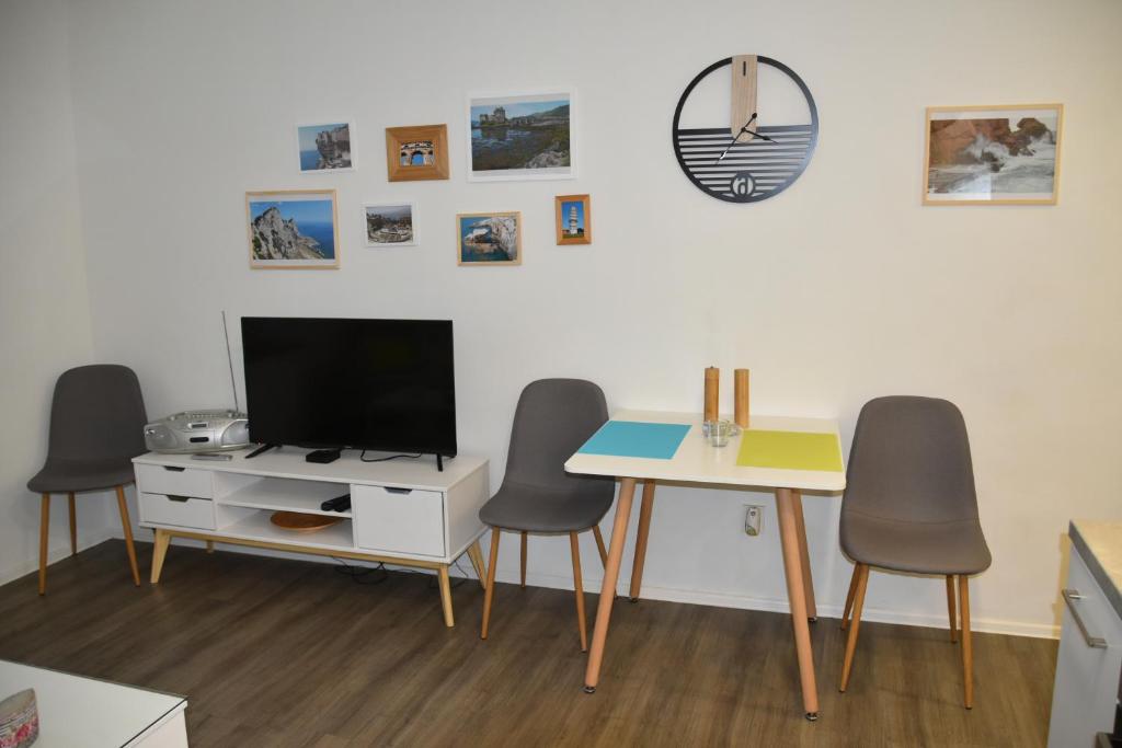 TV a/nebo společenská místnost v ubytování Apartmán Dva na moto