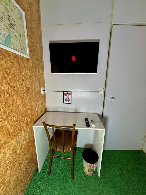 TV a/nebo společenská místnost v ubytování Casa do Rogerio Hostel - Unidade Shopping