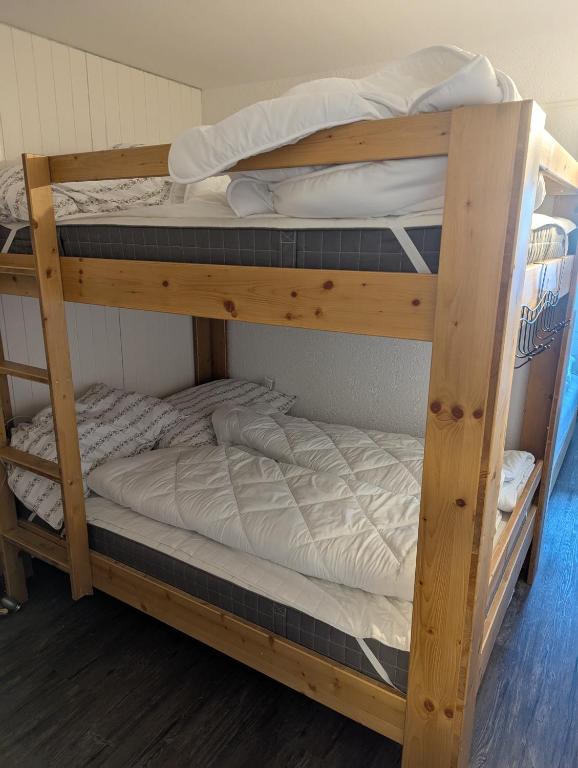 Postel nebo postele na pokoji v ubytování Ski-In, ski-out Thyon