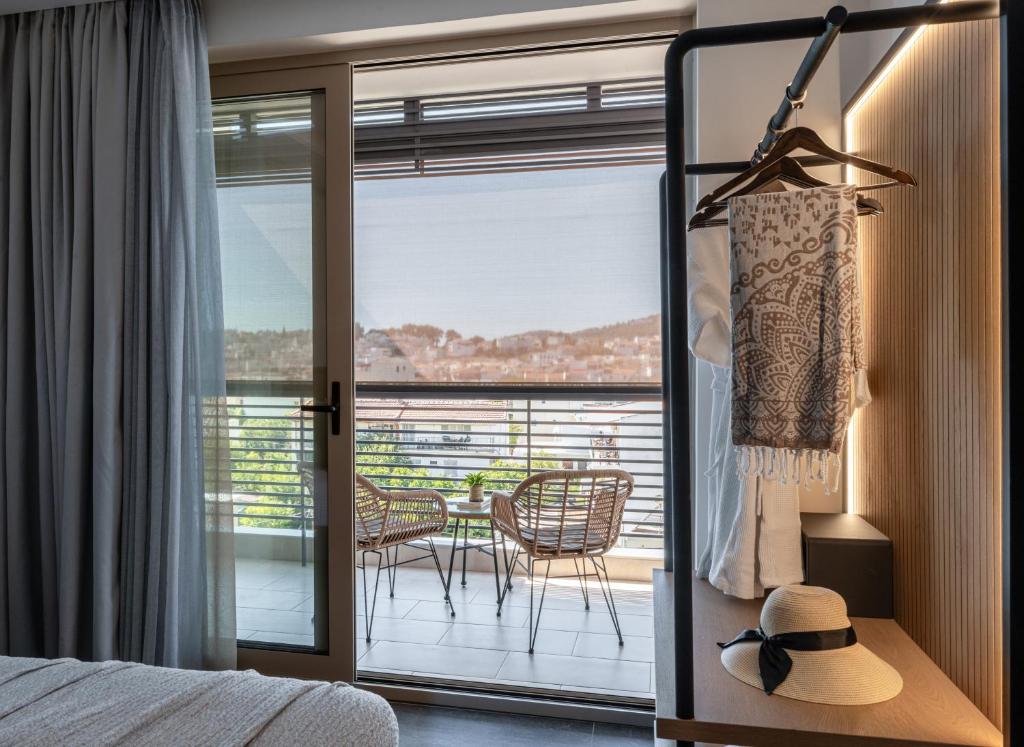 Postel nebo postele na pokoji v ubytování Skia, Premium Key Collection