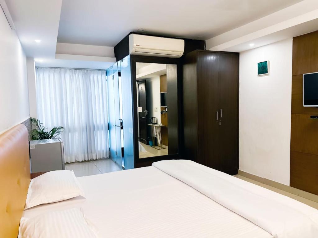 Postel nebo postele na pokoji v ubytování Hotel Blueberry