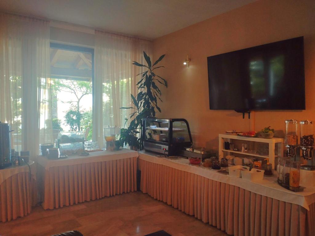 Príslušenstvo na prípravu kávy alebo čaju v ubytovaní Guest House Palme