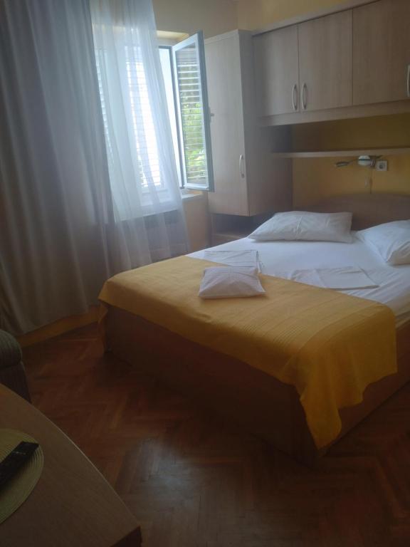 Posteľ alebo postele v izbe v ubytovaní Guest House Palme