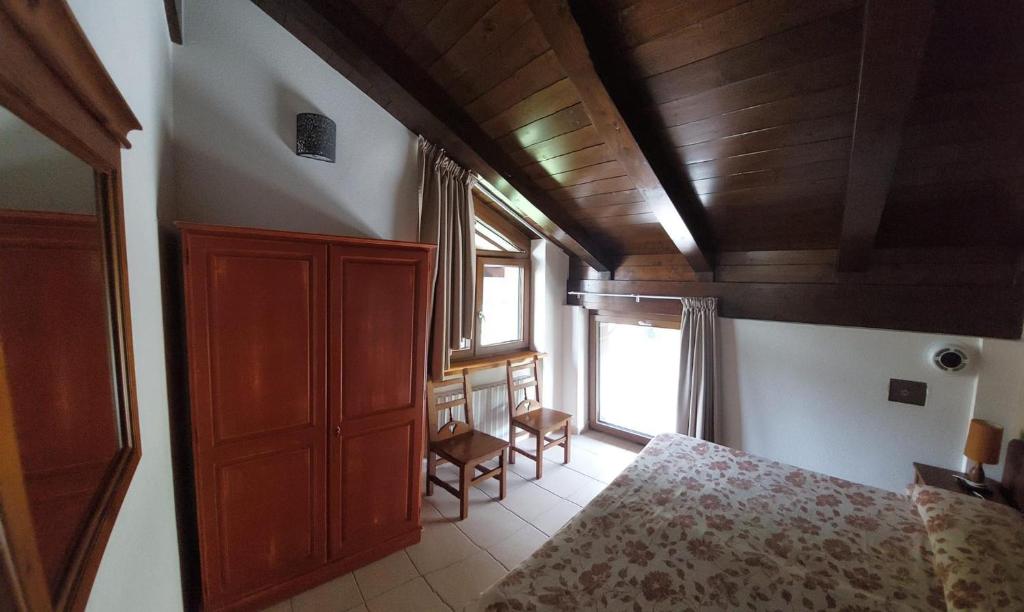 Łóżko lub łóżka w pokoju w obiekcie Residence Les Lacs