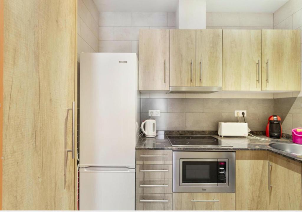 Kuchyňa alebo kuchynka v ubytovaní Great apartment in Sagrada Familia with Balcony
