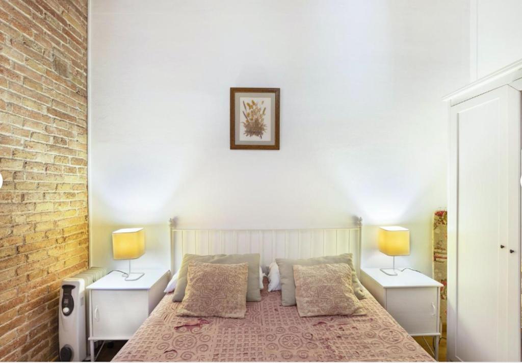 Posteľ alebo postele v izbe v ubytovaní Great apartment in Sagrada Familia with Balcony